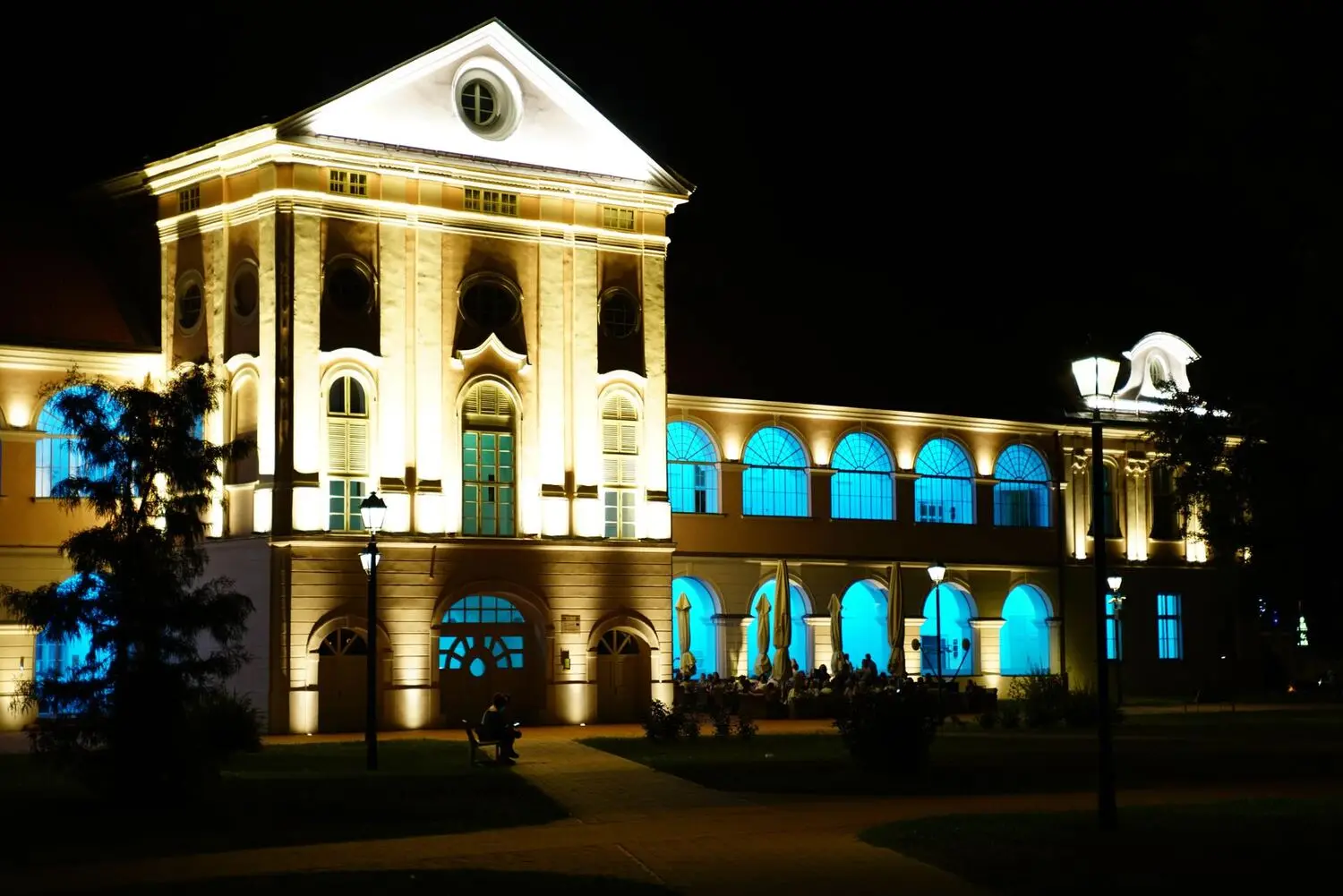Building facade illuminated at night